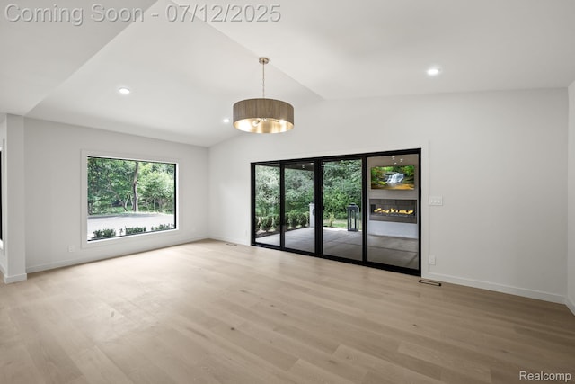 3539 Walbri Dr, Bloomfield Hills, MI 48304 - empty room featuring lofted ceiling, light wood finished floors, and recessed lighting