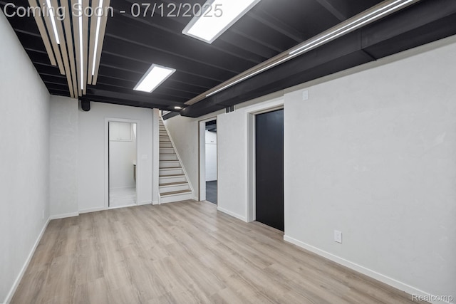 3539 Walbri Dr, Bloomfield Hills, MI 48304 - below grade area featuring stairway and wood finished floors