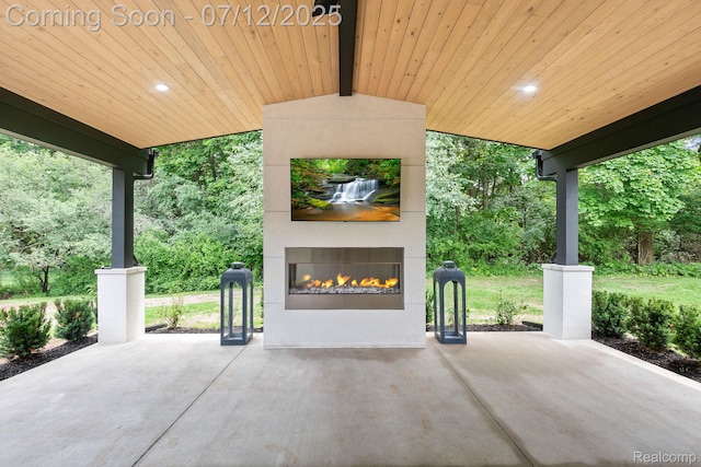 3539 Walbri Dr, Bloomfield Hills, MI 48304 - view of patio with a lit fireplace