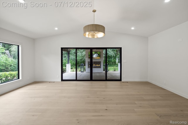 3539 Walbri Dr, Bloomfield Hills, MI 48304 - unfurnished room with lofted ceiling, light wood-style flooring, and recessed lighting