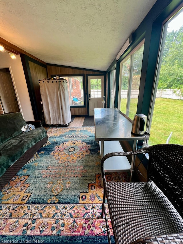 7270 Elizabeth Lake Rd, Waterford, MI 48327 - sunroom with vaulted ceiling and a textured ceiling