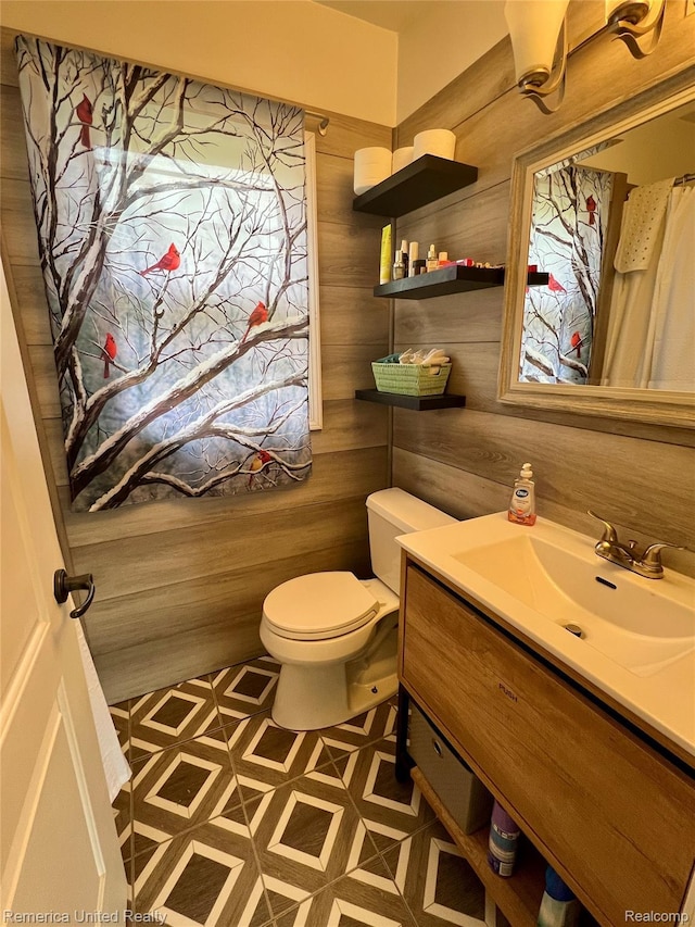 7270 Elizabeth Lake Rd, Waterford, MI 48327 - bathroom with vanity and toilet