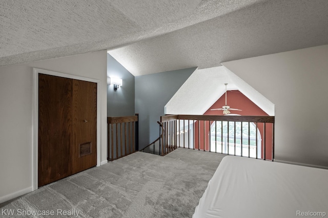 3410 Adams Shore Dr, Waterford, MI 48329 - bedroom with vaulted ceiling, carpet flooring, a textured ceiling, and ceiling fan