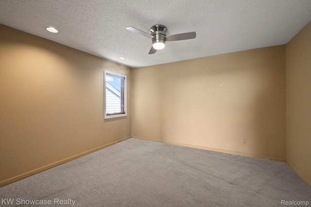 3410 Adams Shore Dr, Waterford, MI 48329 - unfurnished room with light carpet, ceiling fan, a textured ceiling, and recessed lighting