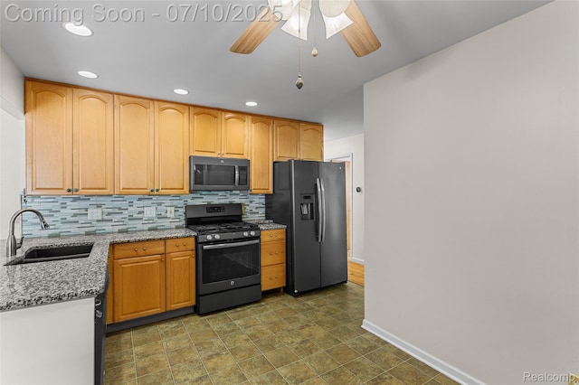 1868 Treadwell St, Westland, MI 48186 - kitchen with range with gas stovetop, black microwave, refrigerator with ice dispenser, recessed lighting, and decorative backsplash