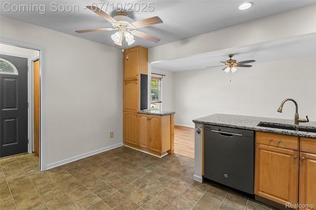 1868 Treadwell St, Westland, MI 48186 - kitchen with dishwasher, ceiling fan, stone counters, and brown cabinetry