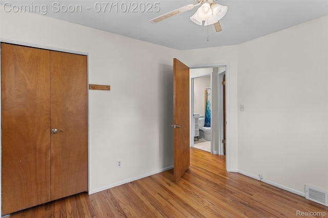 1868 Treadwell St, Westland, MI 48186 - unfurnished bedroom with wood finished floors, a closet, and ceiling fan
