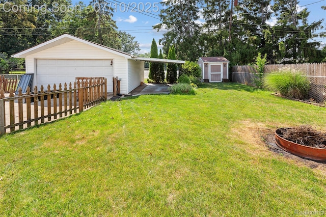 1868 Treadwell St, Westland, MI 48186 - fenced backyard featuring a detached garage and a storage shed