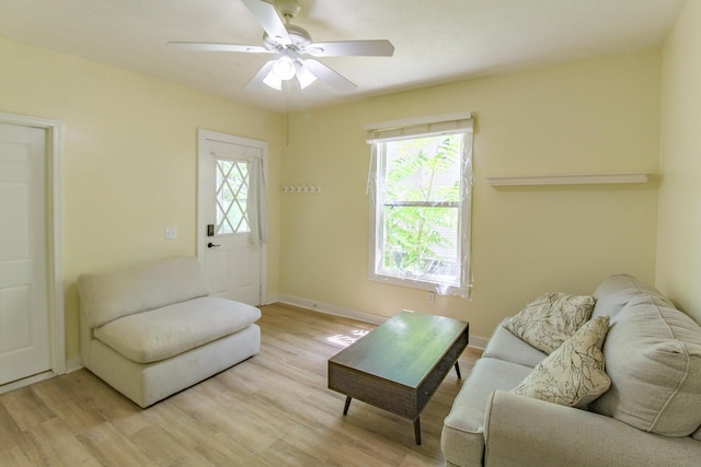 637 Prospect Ave NE, Grand Rapids, MI 49503 - living room featuring light wood-type flooring and a ceiling fan