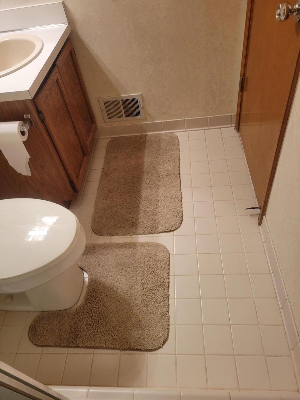 15430 Windmill Dr, Macomb, MI 48044 - bathroom with tile patterned floors and vanity
