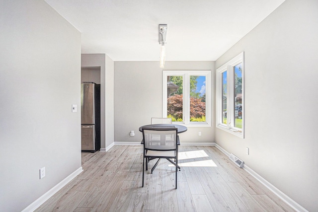 1721 Fountainview Ct SE, Caledonia, MI 49316 - dining room with light wood finished floors and baseboards