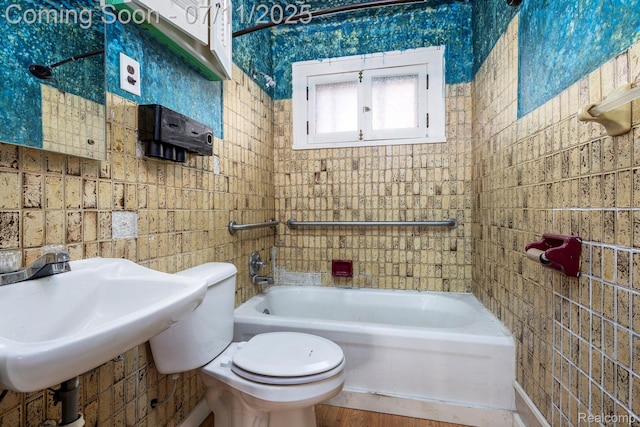 77 Hubbard St, Mount Clemens, MI 48043 - bathroom with tile walls and wood finished floors