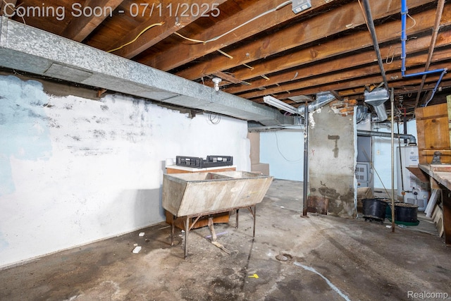 77 Hubbard St, Mount Clemens, MI 48043 - unfinished basement with water heater