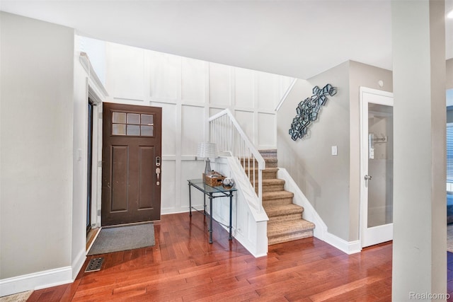 25279 Greenbrooke Dr, Southfield, MI 48033 - entryway featuring wood finished floors and stairs