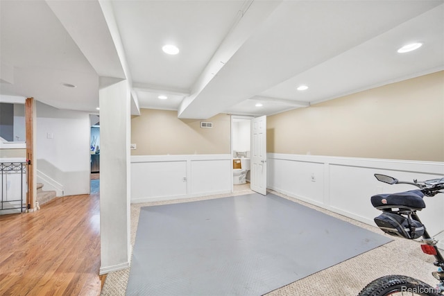 25279 Greenbrooke Dr, Southfield, MI 48033 - exercise area with wainscoting, recessed lighting, wood finished floors, and a decorative wall