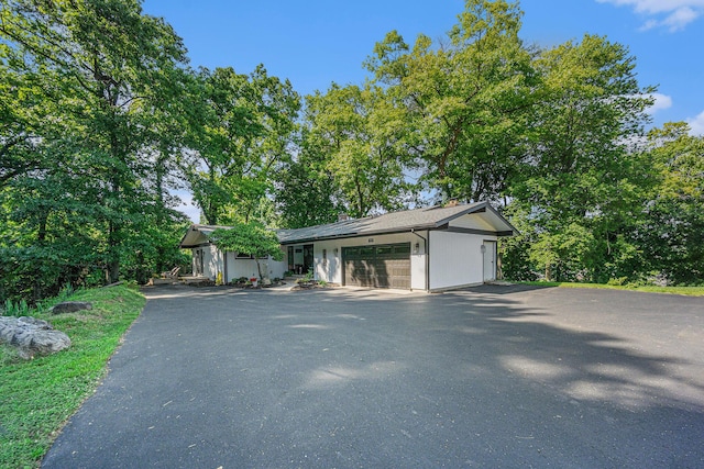 191 S Lake Doster Dr, Plainwell, MI 49080 - view of front of property with a garage and driveway