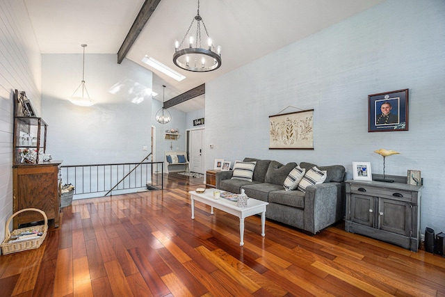 191 S Lake Doster Dr, Plainwell, MI 49080 - living area featuring a chandelier, hardwood / wood-style floors, beam ceiling, and high vaulted ceiling