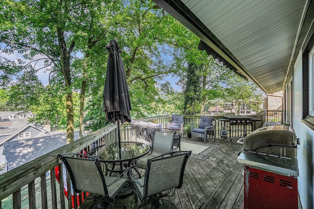 191 S Lake Doster Dr, Plainwell, MI 49080 - deck featuring outdoor dining area