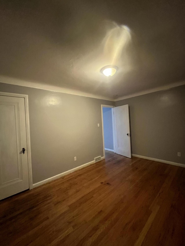 16609 Edmore Dr, Detroit, MI 48205 - unfurnished room with dark wood-style flooring and baseboards