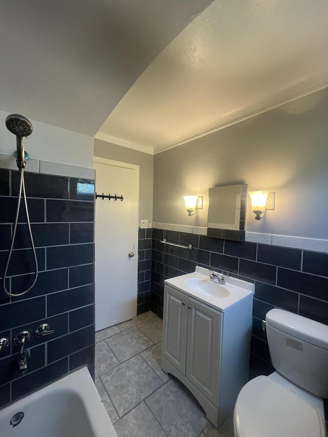 16609 Edmore Dr, Detroit, MI 48205 - bathroom with tile walls, vanity, wainscoting, and shower / bath combination