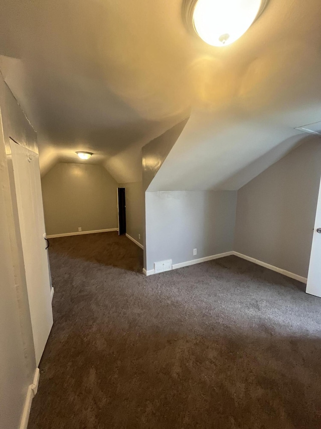 16609 Edmore Dr, Detroit, MI 48205 - additional living space featuring lofted ceiling and dark colored carpet