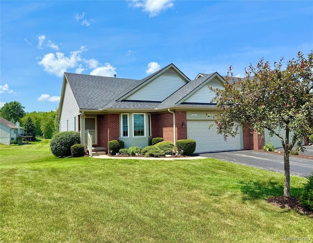 6426 Club Ct W, Grand Blanc, MI 48439 - view of front of property with a garage, asphalt driveway, brick siding, a shingled roof, and a front yard