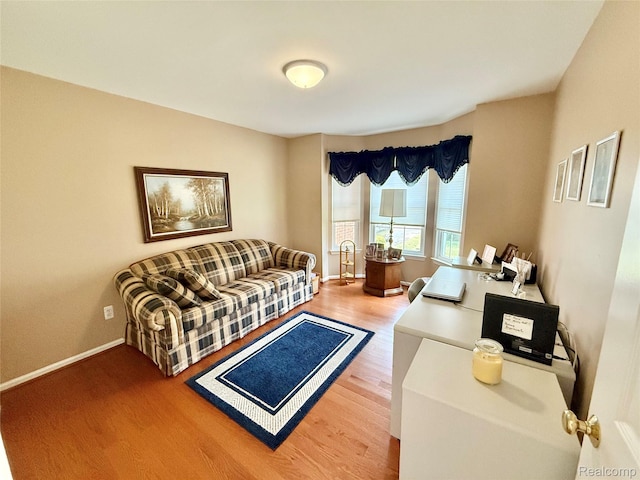 6426 Club Ct W, Grand Blanc, MI 48439 - living area with wood finished floors and baseboards