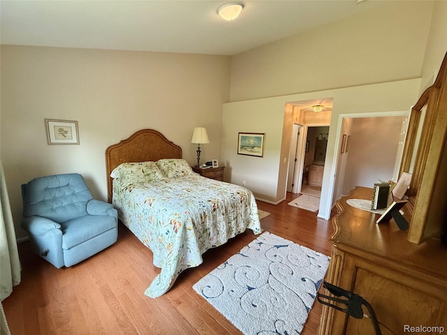 6426 Club Ct W, Grand Blanc, MI 48439 - bedroom featuring wood finished floors and baseboards