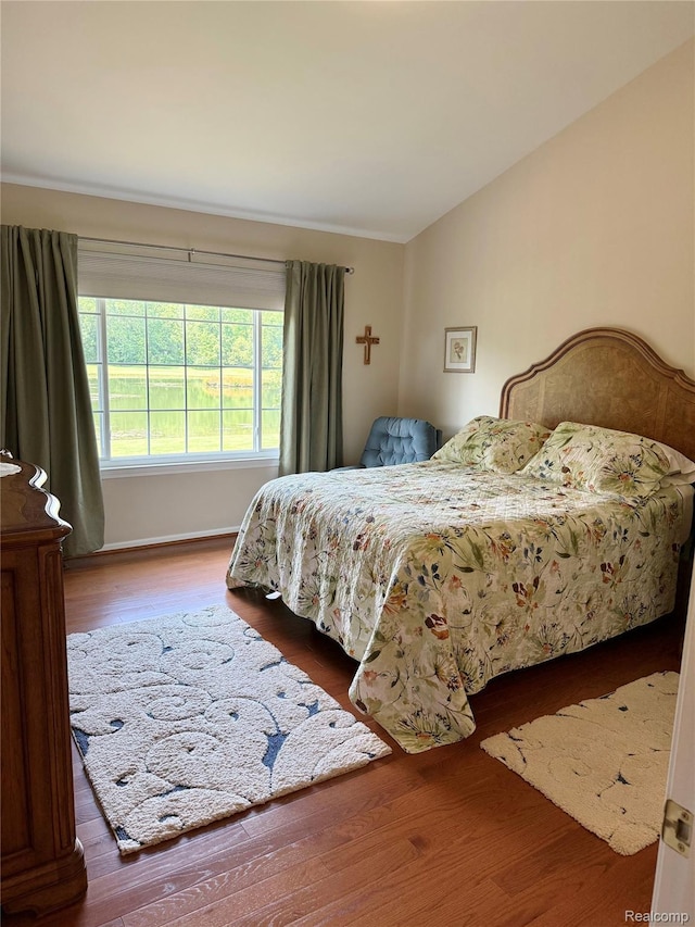 6426 Club Ct W, Grand Blanc, MI 48439 - bedroom with wood finished floors and baseboards