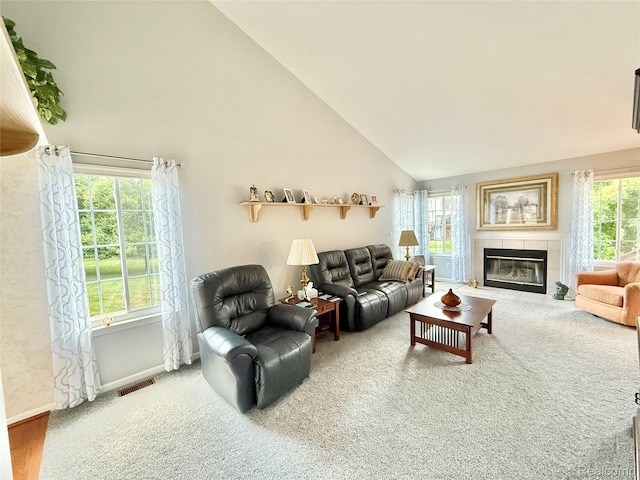6426 Club Ct W, Grand Blanc, MI 48439 - carpeted living area featuring a fireplace and high vaulted ceiling