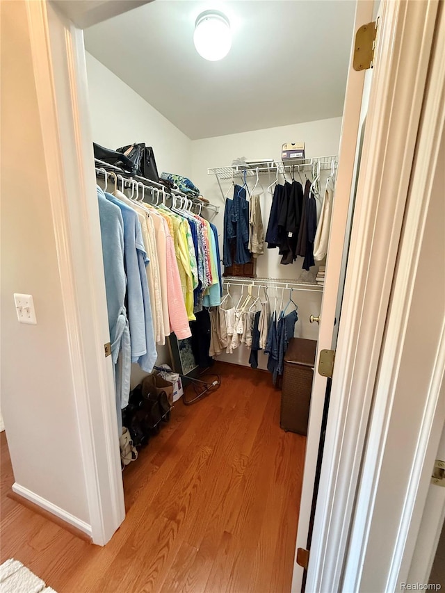 6426 Club Ct W, Grand Blanc, MI 48439 - spacious closet featuring wood finished floors