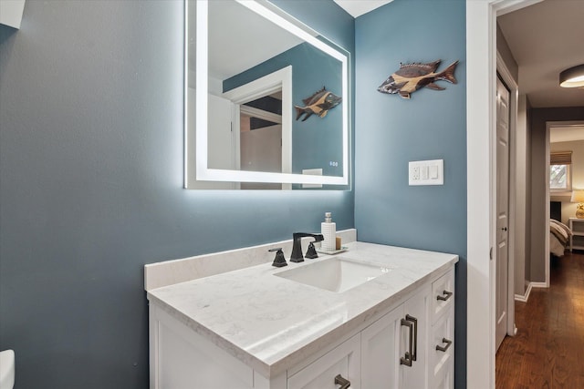 20955 Robinwood St, Farmington, MI 48336 - bathroom with vanity and wood finished floors