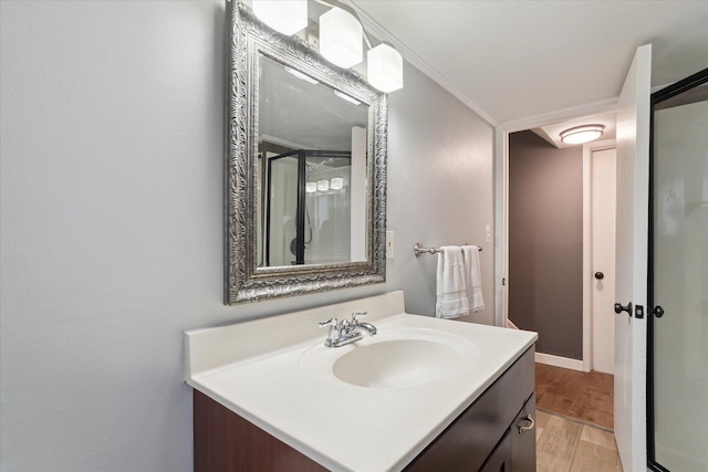 20955 Robinwood St, Farmington, MI 48336 - full bathroom with vanity, wood finished floors, and an enclosed shower