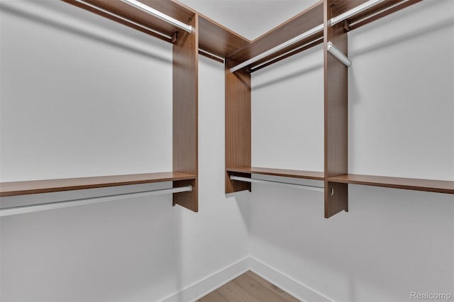 715 Gardenia Ave, Royal Oak, MI 48067 - spacious closet featuring wood finished floors