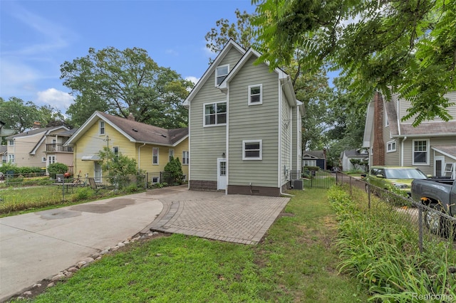 715 Gardenia Ave, Royal Oak, MI 48067 - back of property with a residential view and a patio