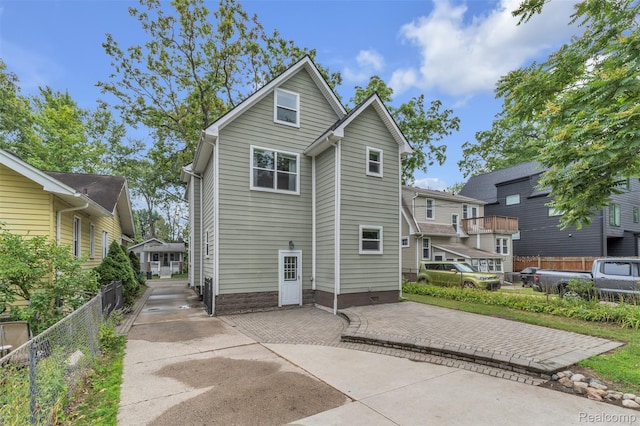 715 Gardenia Ave, Royal Oak, MI 48067 - back of house with a patio area