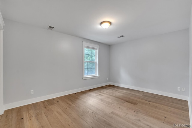 715 Gardenia Ave, Royal Oak, MI 48067 - unfurnished room featuring wood finished floors
