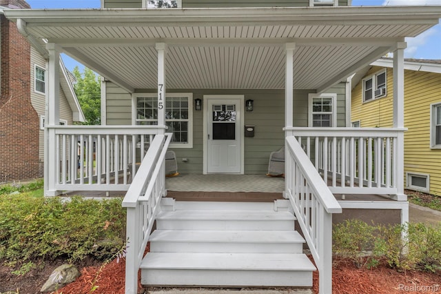 715 Gardenia Ave, Royal Oak, MI 48067 - doorway to property featuring covered porch
