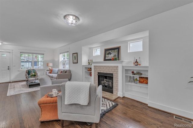 715 Gardenia Ave, Royal Oak, MI 48067 - living room featuring wood finished floors and a fireplace