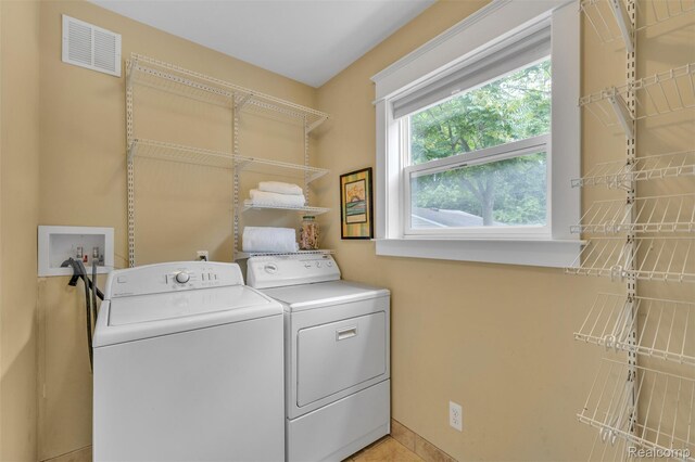 715 Gardenia Ave, Royal Oak, MI 48067 - laundry room with washer and dryer and baseboards