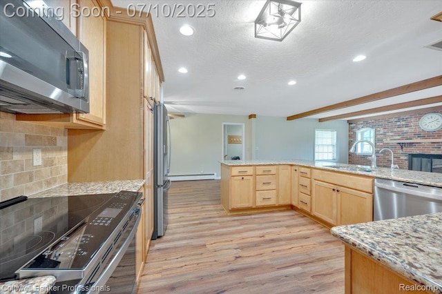 1526 Rulane Dr, Lapeer, MI 48446 - kitchen featuring light brown cabinetry, stainless steel appliances, light wood-style flooring, backsplash, and recessed lighting