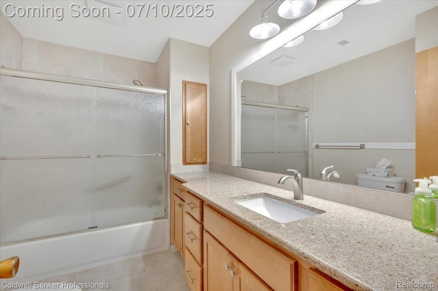 1526 Rulane Dr, Lapeer, MI 48446 - full bath featuring vanity, enclosed tub / shower combo, and tile patterned flooring