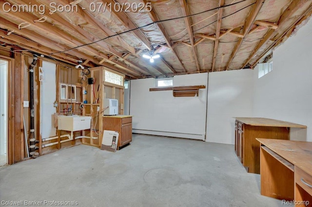 1526 Rulane Dr, Lapeer, MI 48446 - below grade area featuring a baseboard heating unit and a sink