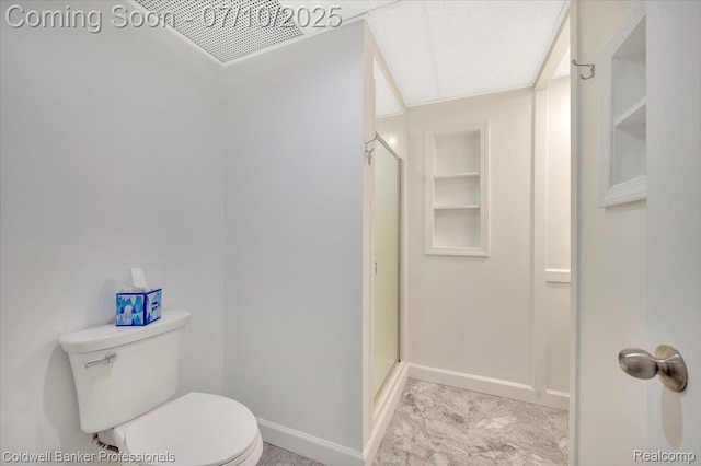 1526 Rulane Dr, Lapeer, MI 48446 - bathroom featuring built in shelves, a stall shower, and marble look tiles