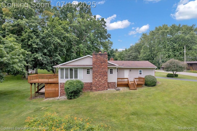 1526 Rulane Dr, Lapeer, MI 48446 - rear view of property featuring a deck, a chimney, and a lawn