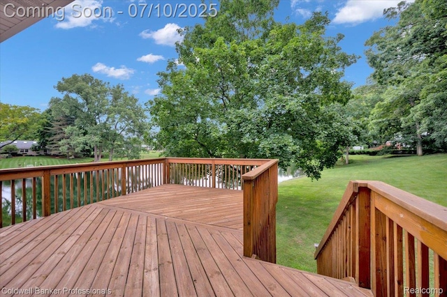 1526 Rulane Dr, Lapeer, MI 48446 - wooden terrace with a lawn and view of wooded area