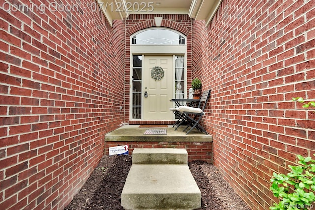 1128 Andover Cir, Commerce Twp, MI 48390 - view of exterior entry with brick siding