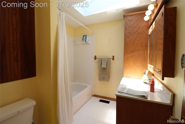 9360 Gale Rd, Goodrich, MI 48438 - full bath with tile patterned floors, vanity, a skylight, and shower / bath combo with shower curtain