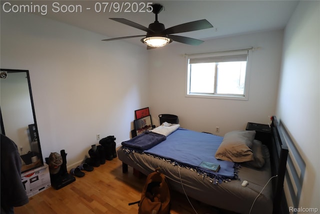 9360 Gale Rd, Goodrich, MI 48438 - bedroom with wood finished floors and ceiling fan