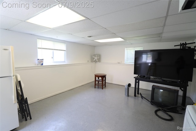 9360 Gale Rd, Goodrich, MI 48438 - basement featuring a drop ceiling and freestanding refrigerator